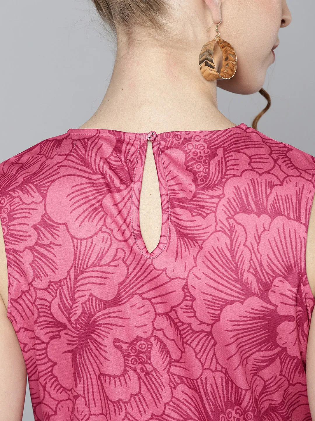 Women Fuchsia Floral Sleeveless Knit Peplum Top
