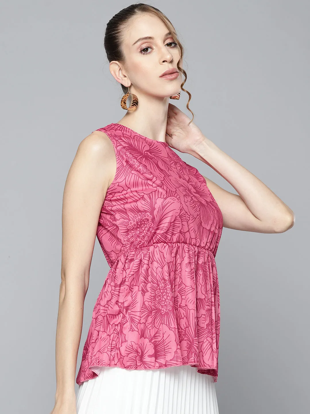 Women Fuchsia Floral Sleeveless Knit Peplum Top