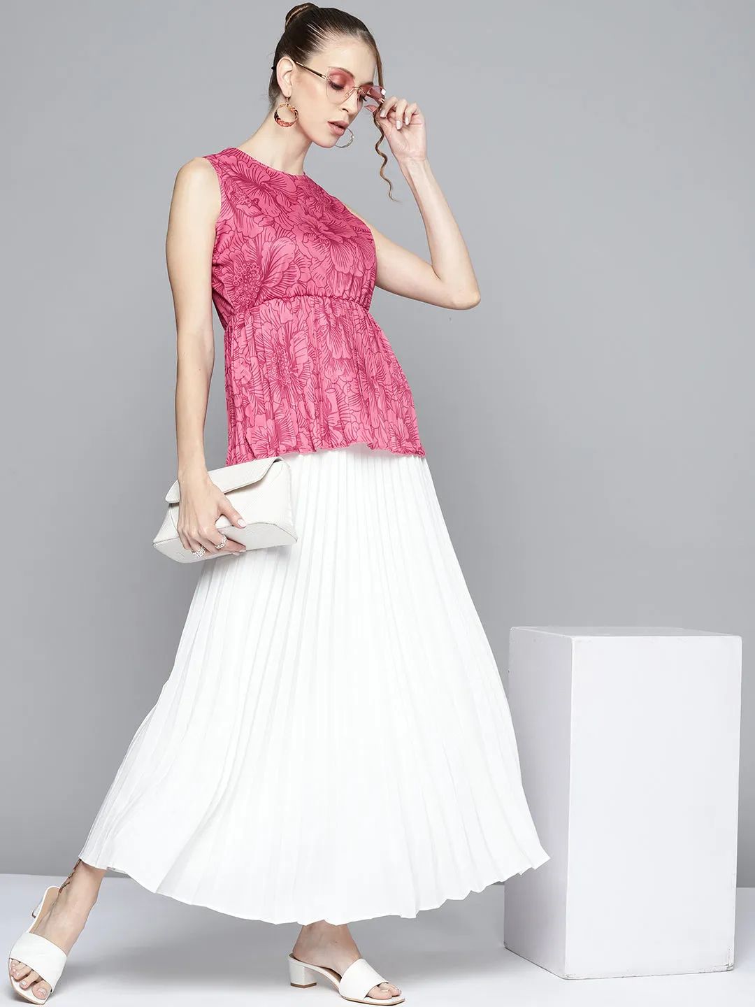 Women Fuchsia Floral Sleeveless Knit Peplum Top